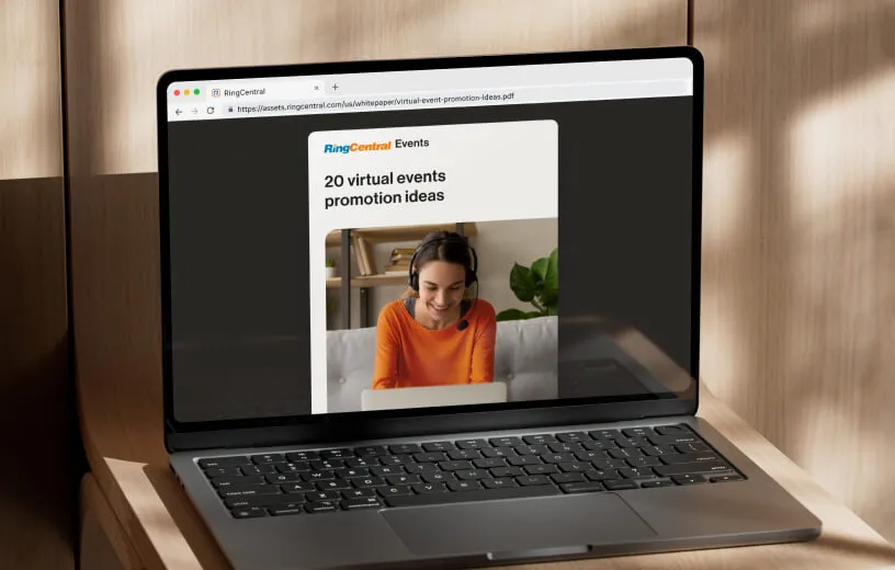 RingCentral whitepaper: a woman working in front of a laptop